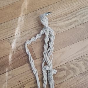 Plant hanger holder